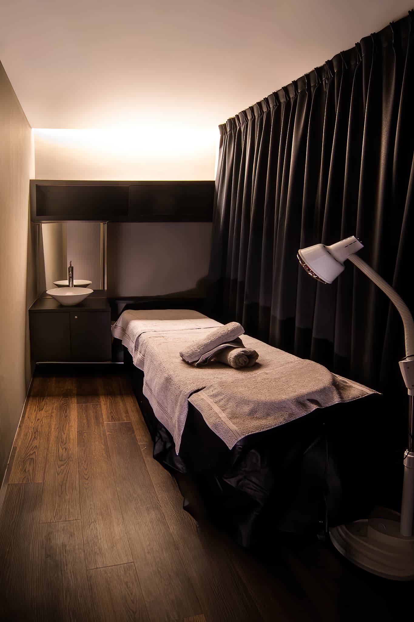 Modern spa facility with contemporary design showcasing premium beauty and wellness treatment areas