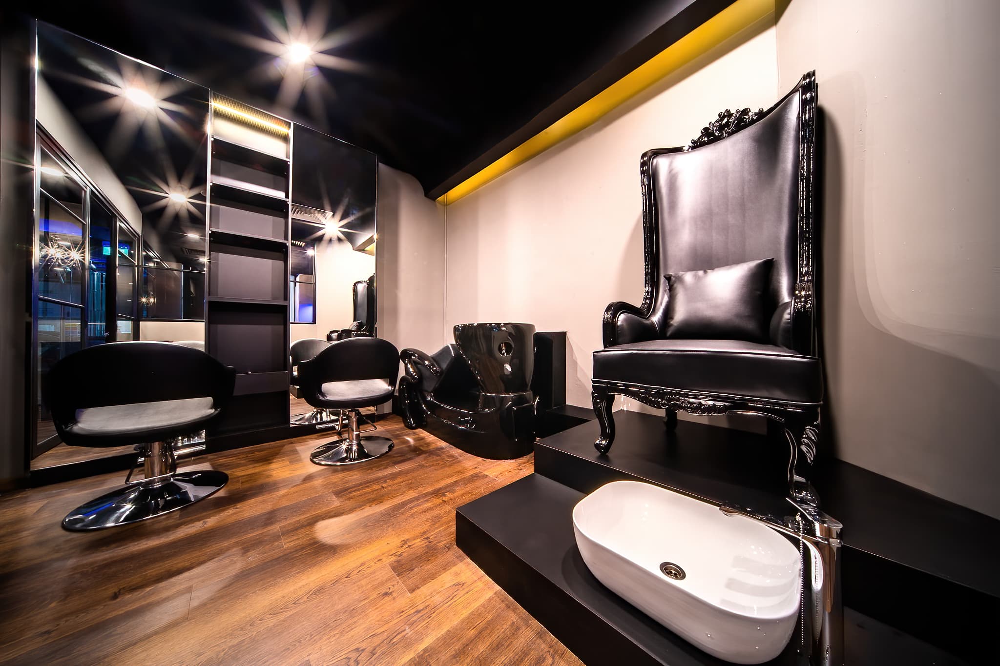 Premium beauty treatment room featuring advanced skincare technology and professional beautician workspace